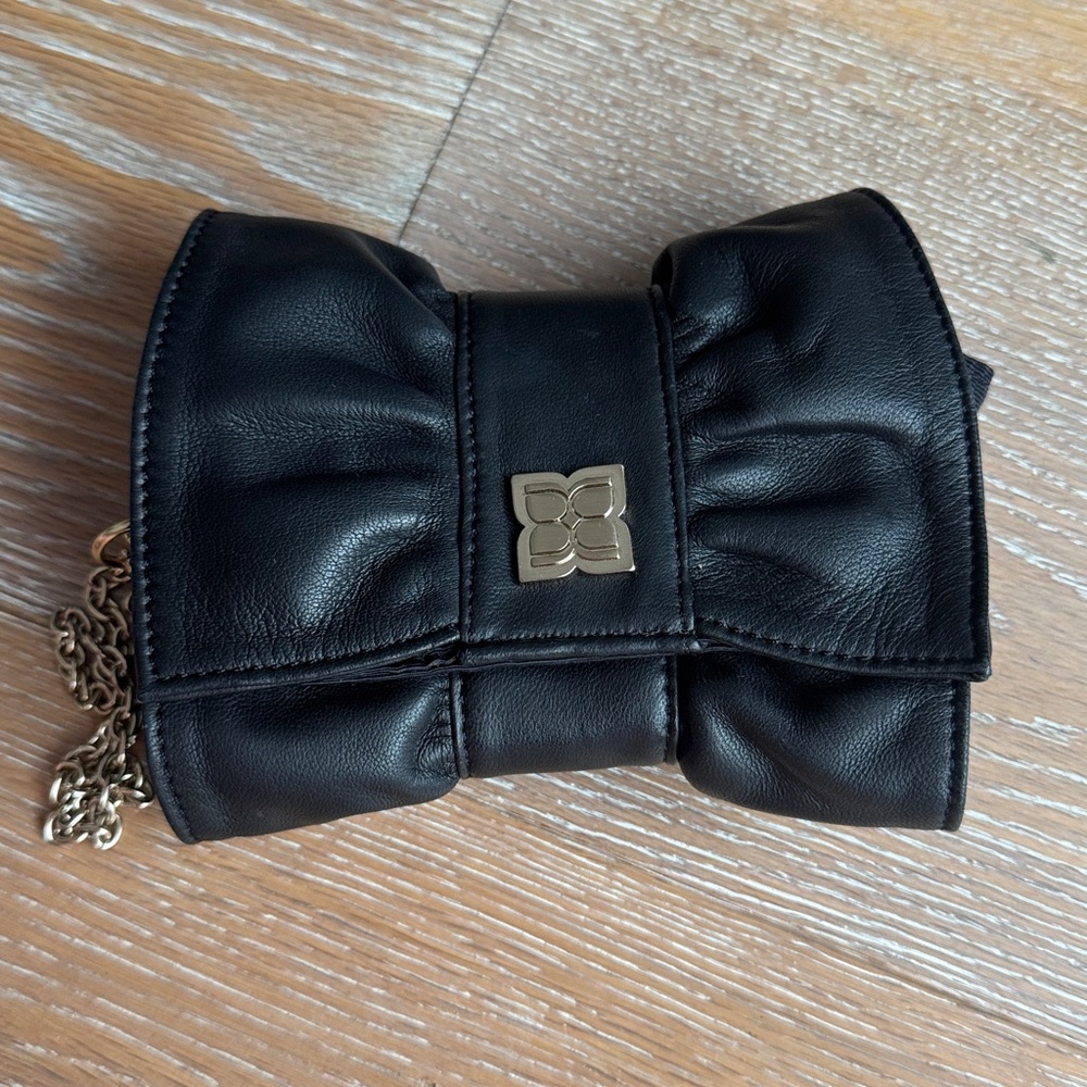 BCBGMaxAzria Black and Gold Bow Clutch Wristlet